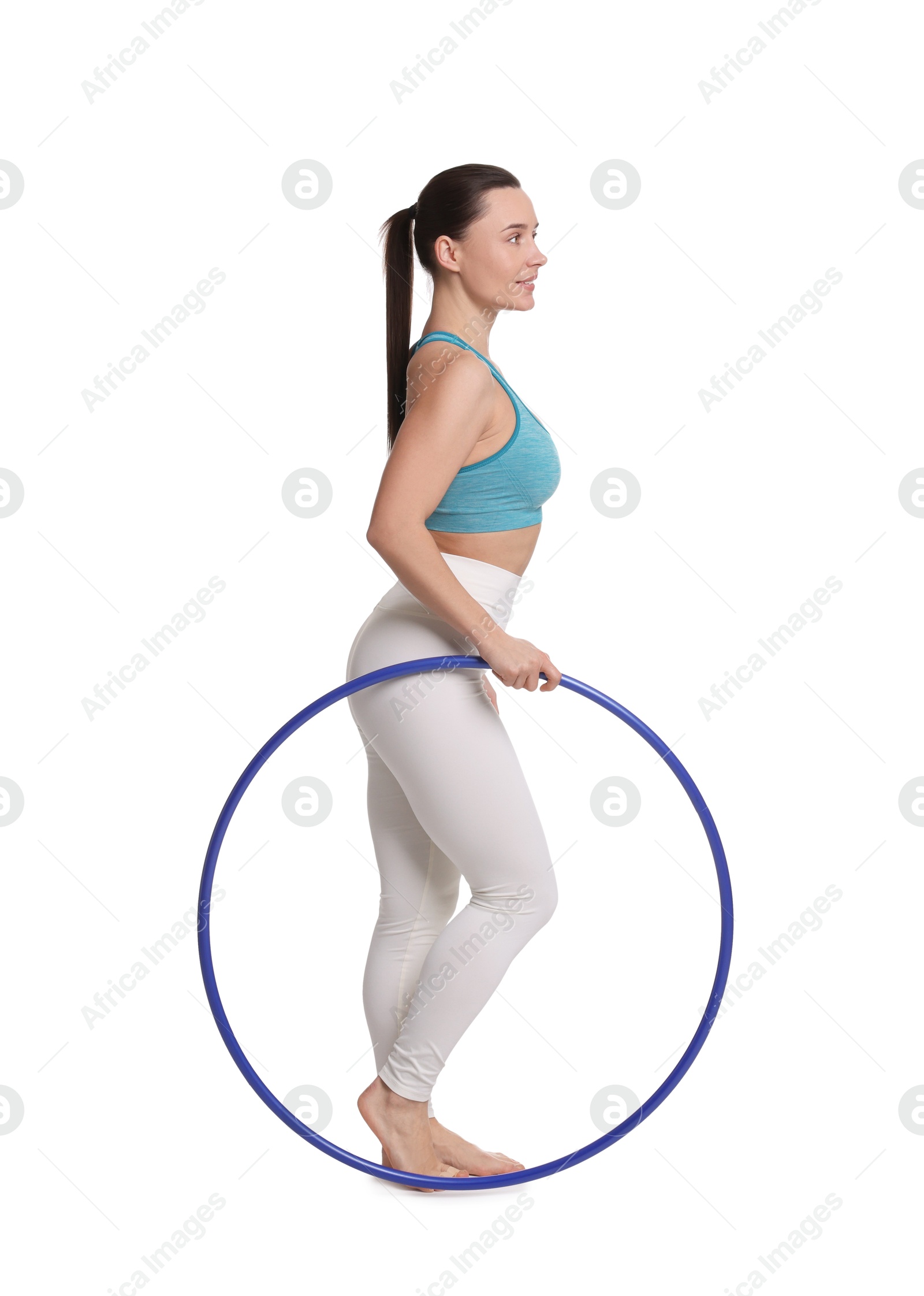 Photo of Smiling woman with hula hoop on white background