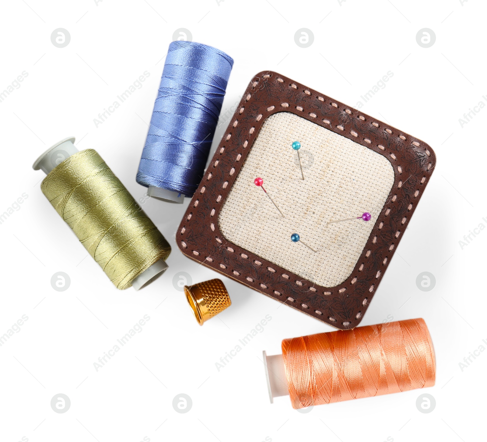 Photo of Different sewing supplies isolated on white, top view