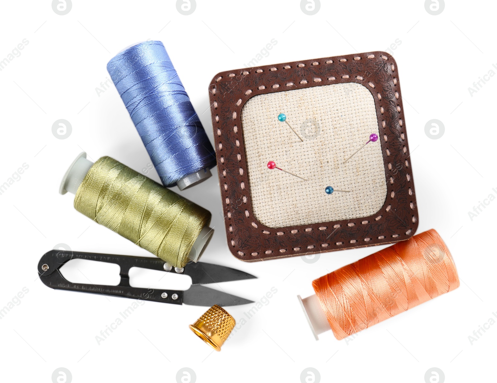 Photo of Different sewing supplies isolated on white, top view