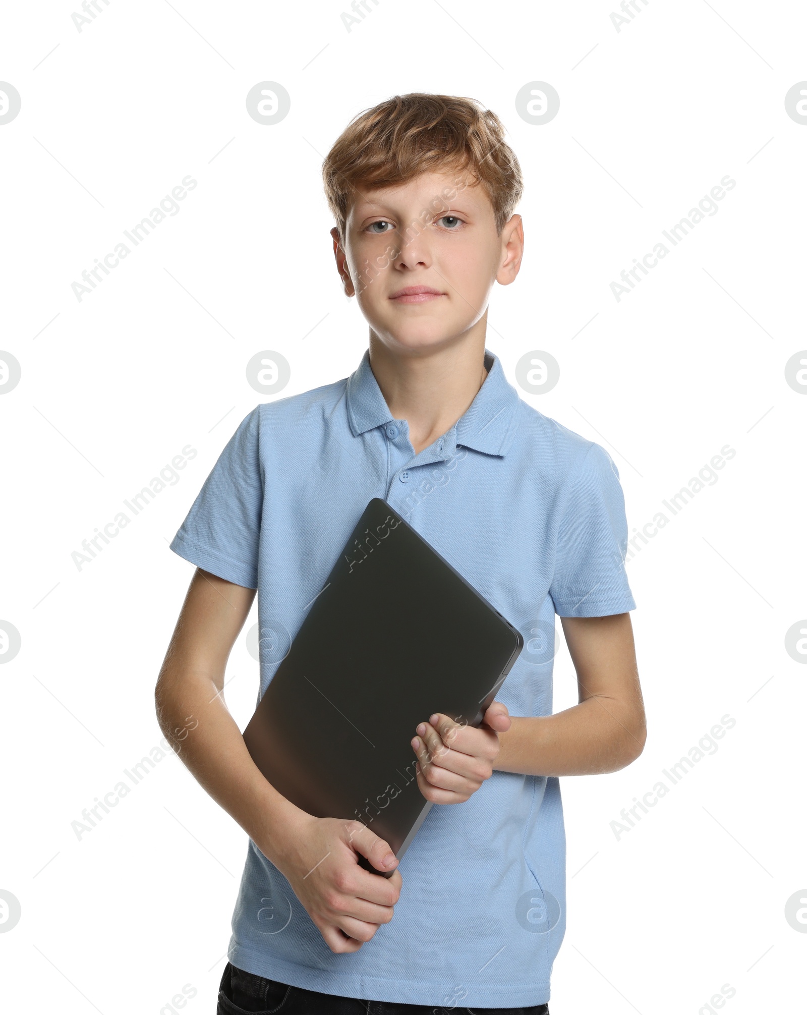 Photo of Portrait of teenage boy with laptop on white background