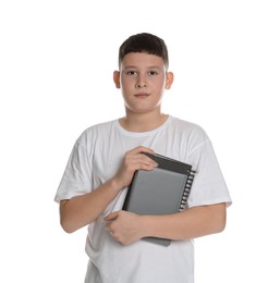 Photo of Portrait of teenage boy with books on white background