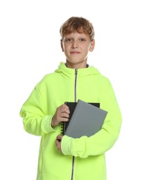 Photo of Portrait of teenage boy with books on white background