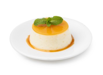 Photo of Tasty pudding with caramel sauce and mint isolated on white