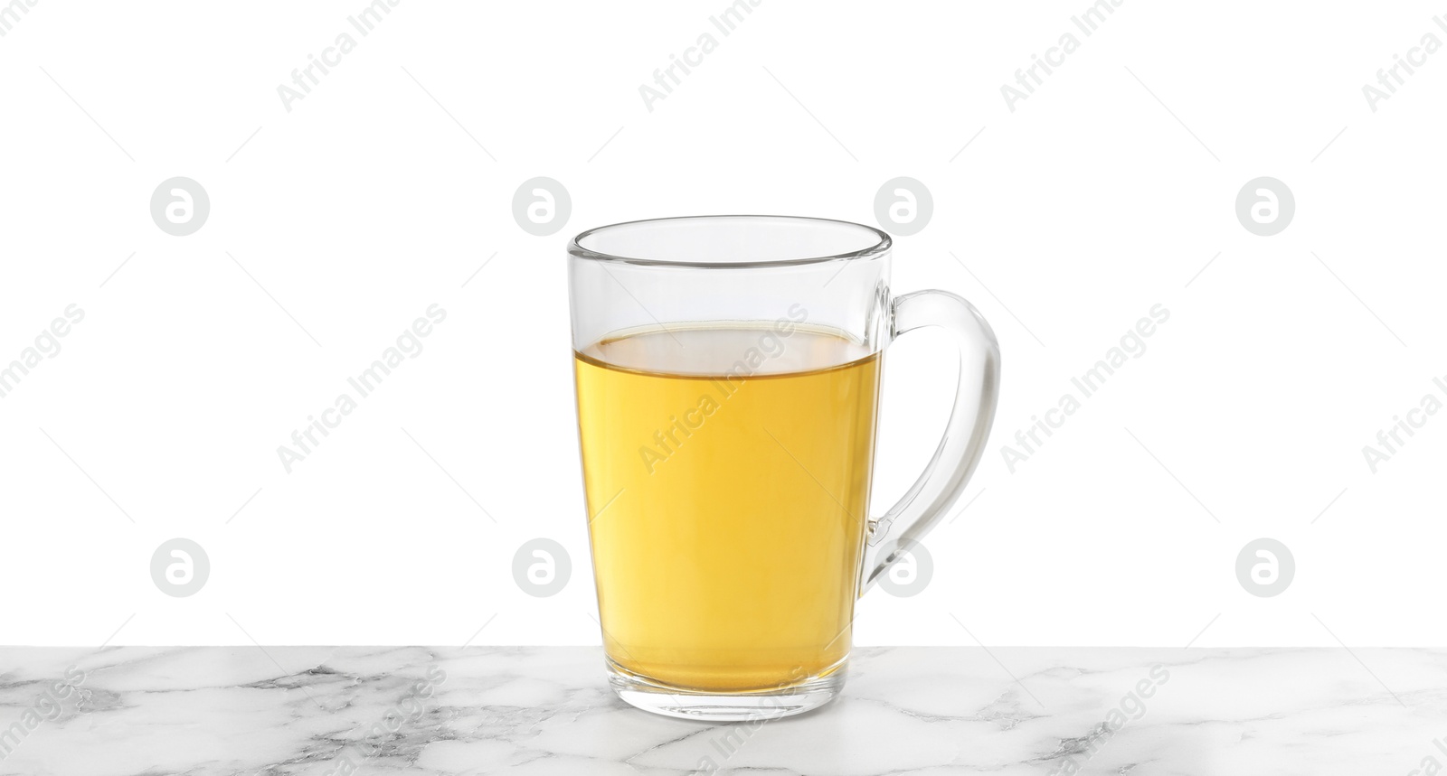 Photo of Refreshing green tea in cup on marble table against white background