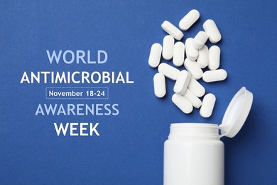 Image of World antimicrobial awareness week. Bottle and scattered pills on blue background, top view