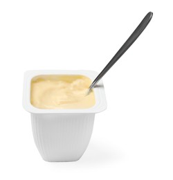 Photo of Delicious yogurt in plastic cup with spoon isolated on white