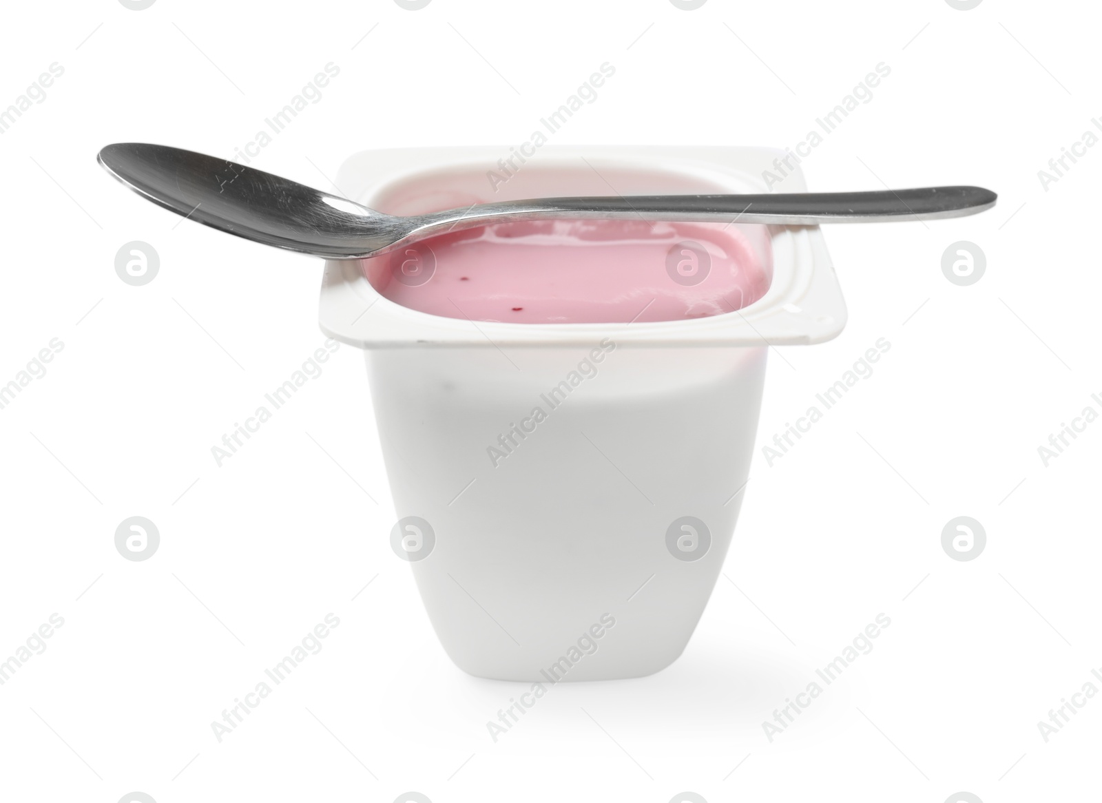 Photo of Delicious yogurt in plastic cup with spoon isolated on white