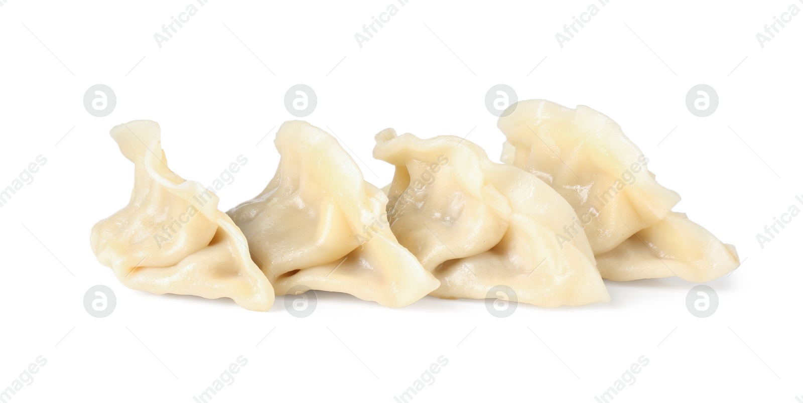 Photo of Tasty boiled gyoza (dumplings) isolated on white