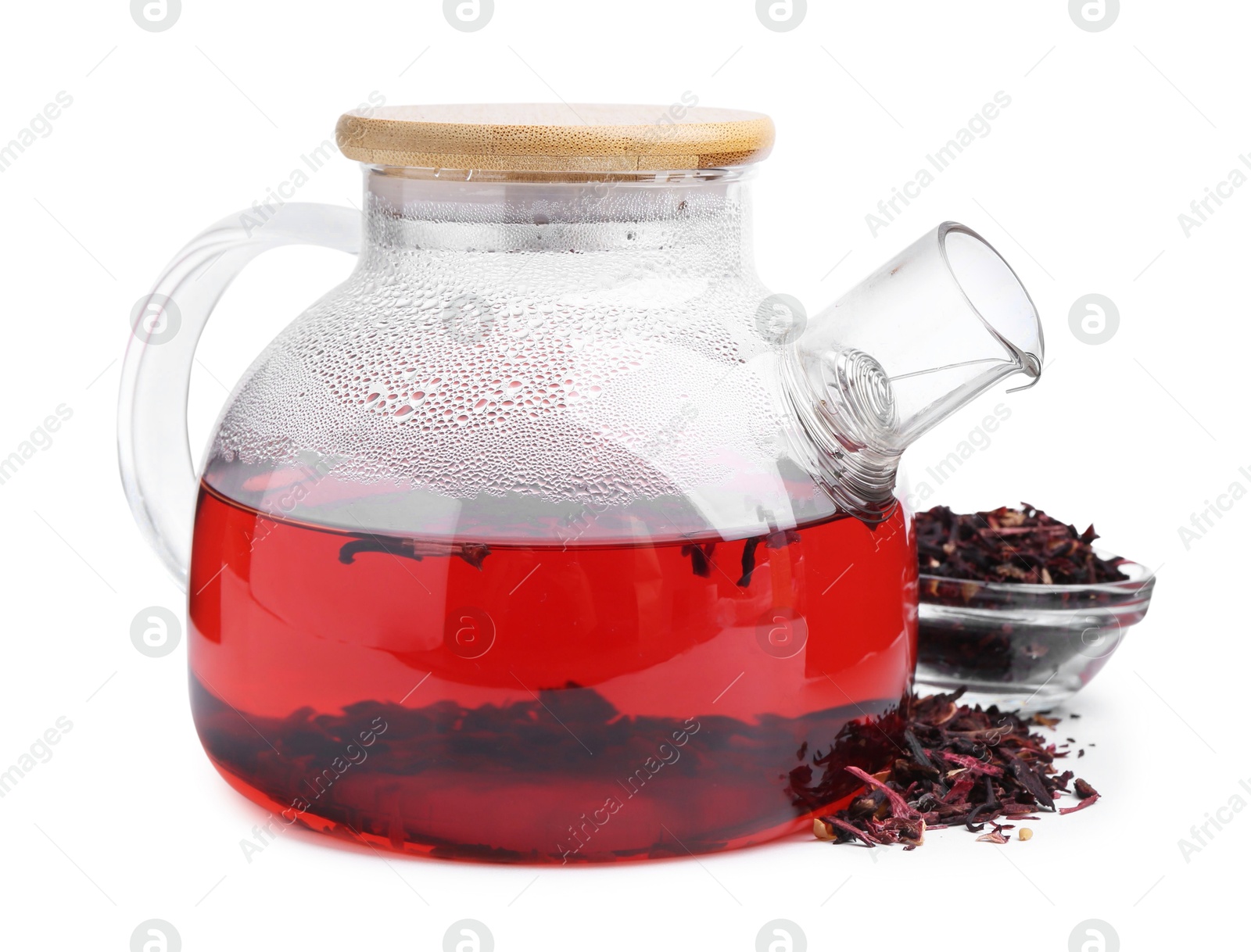 Photo of Tasty hibiscus tea in teapot isolated on white