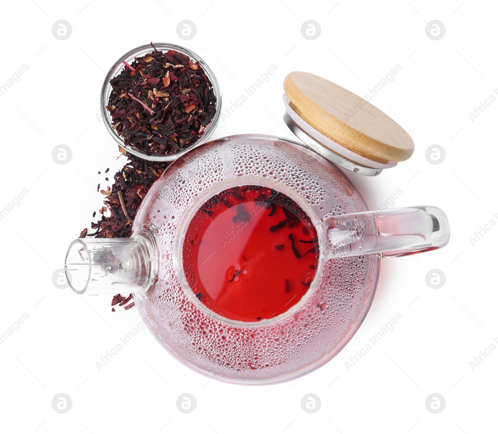 Photo of Tasty hibiscus tea in glass cup isolated on white, top view