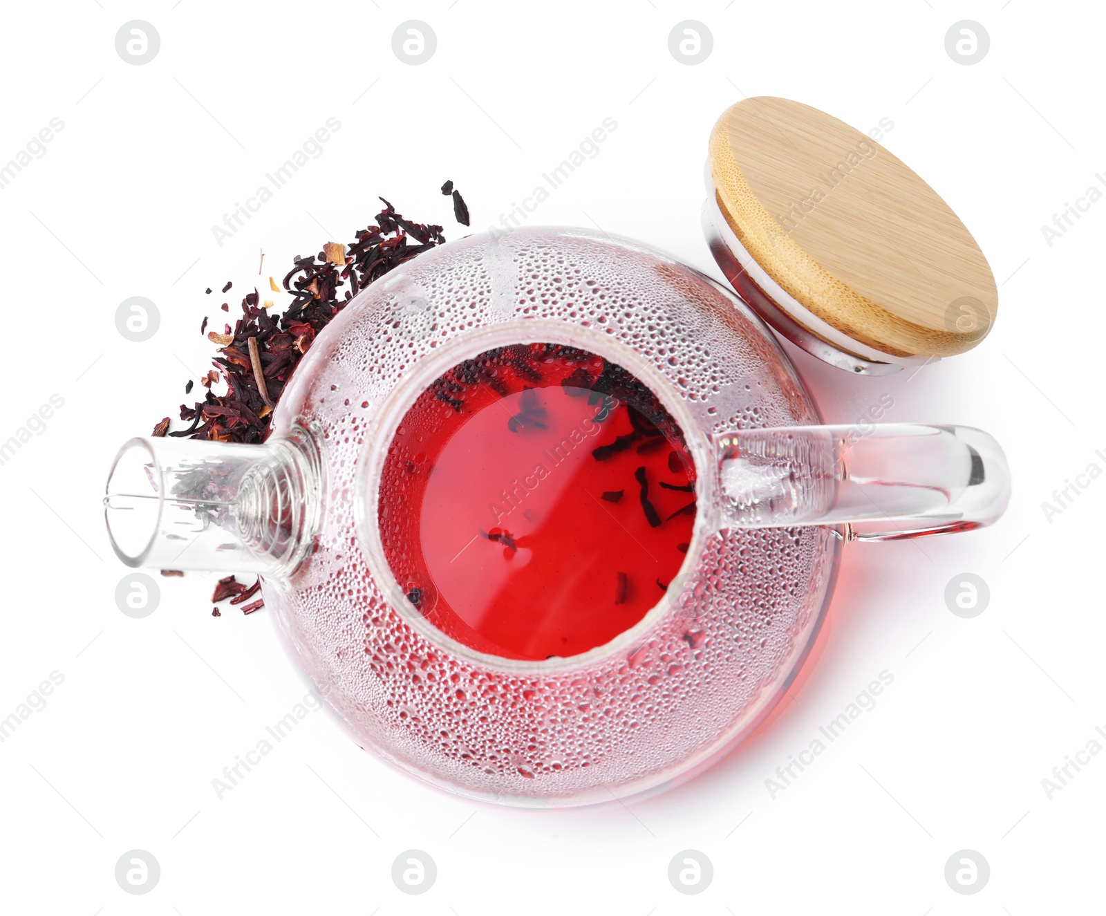 Photo of Tasty hibiscus tea in glass cup isolated on white, top view