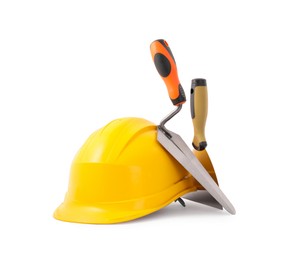 Photo of Hardhat and construction tools isolated on white