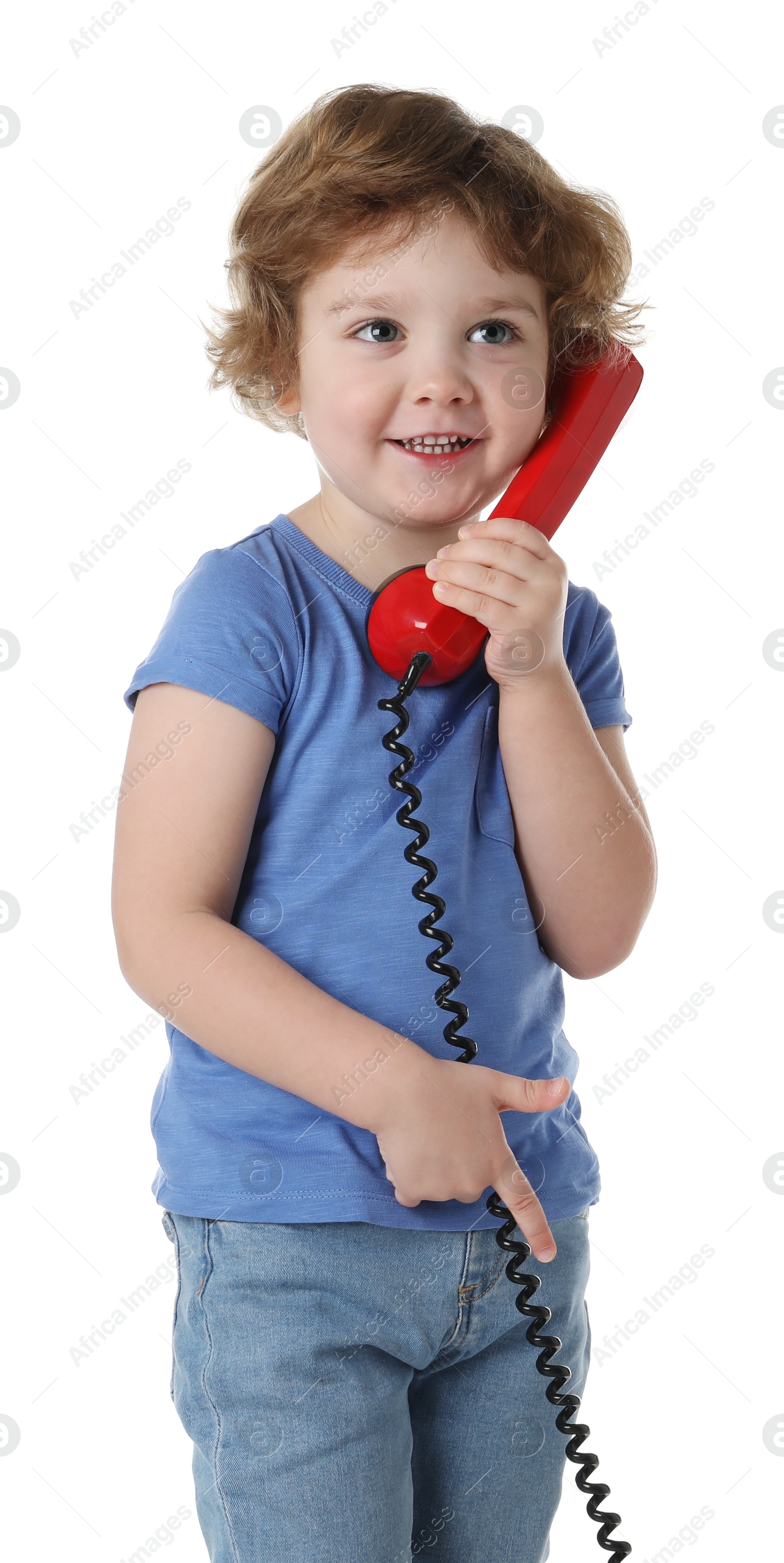 Photo of Cute little boy with telephone handset on white background