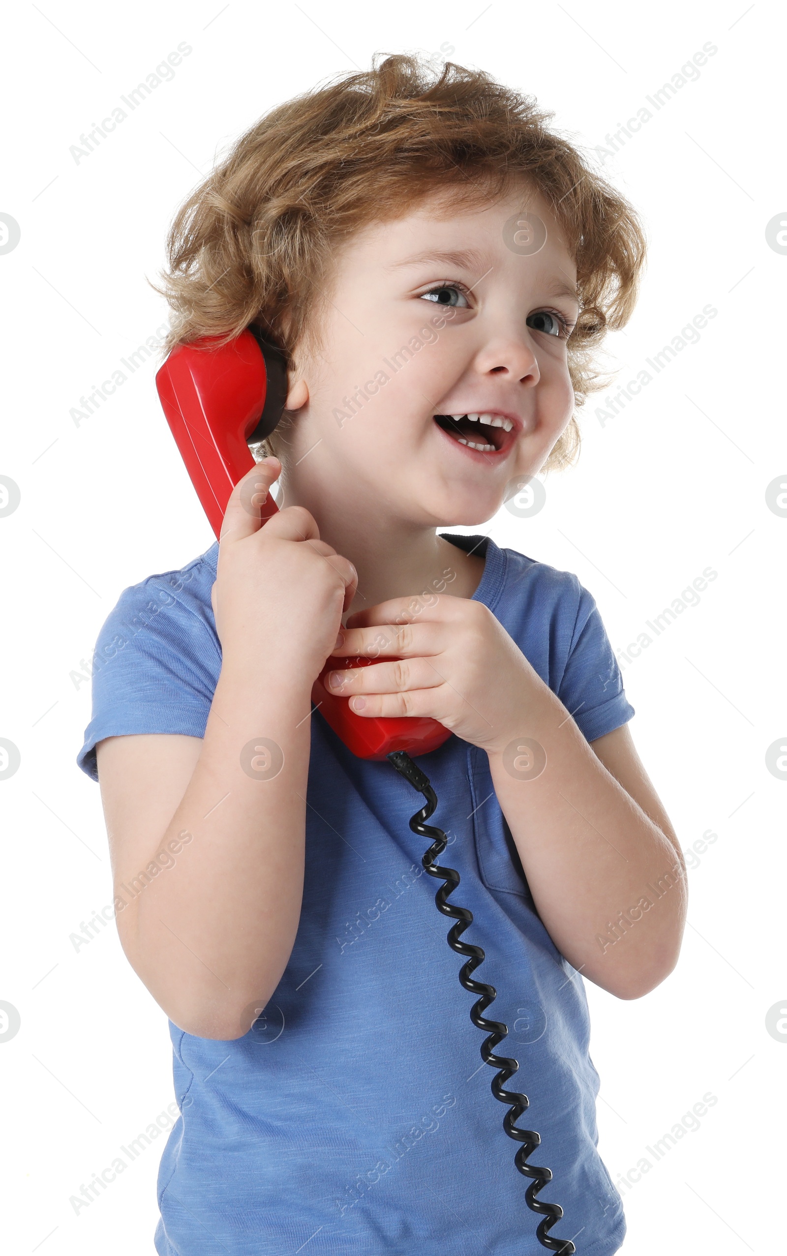 Photo of Cute little boy with telephone handset on white background