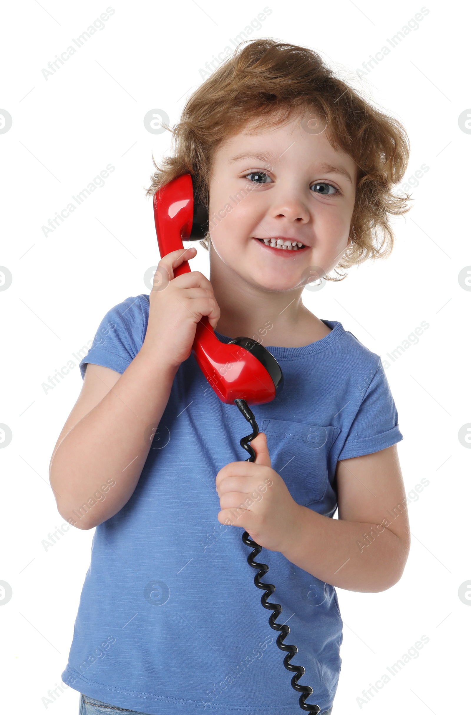 Photo of Cute little boy with telephone handset on white background