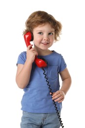 Photo of Cute little boy with telephone handset on white background