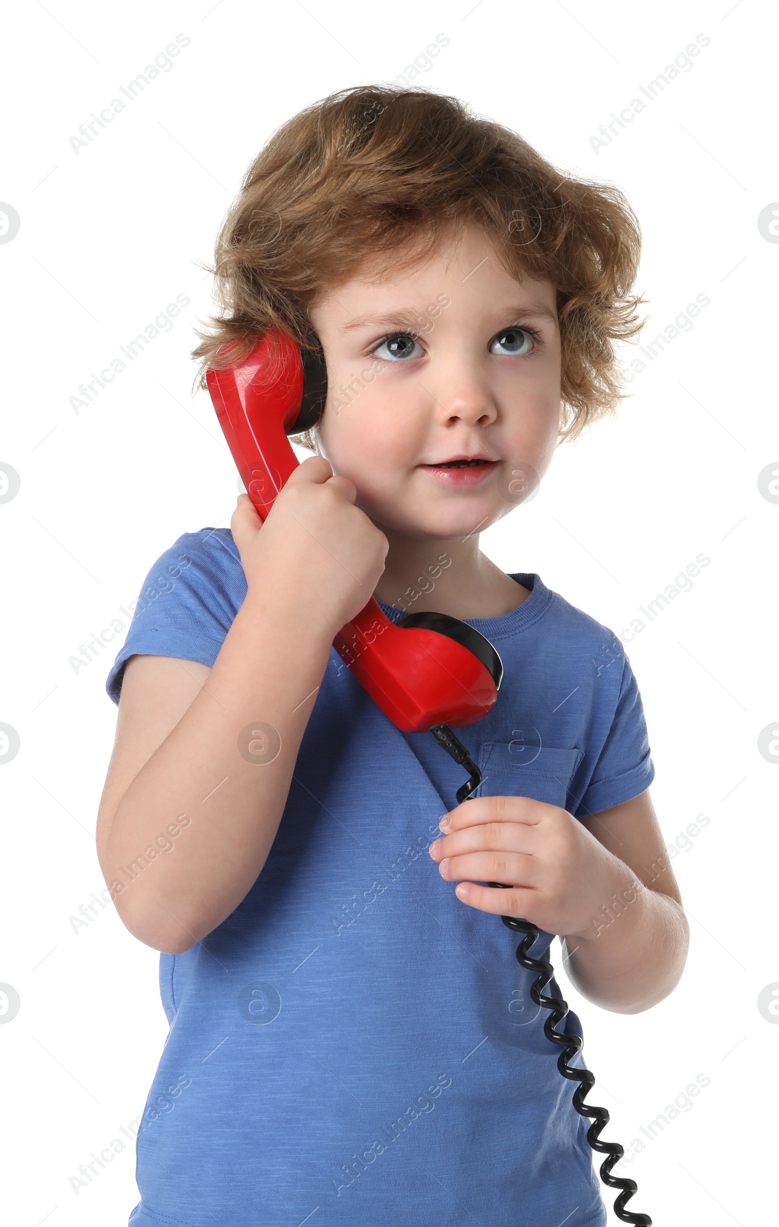 Photo of Cute little boy with telephone handset on white background