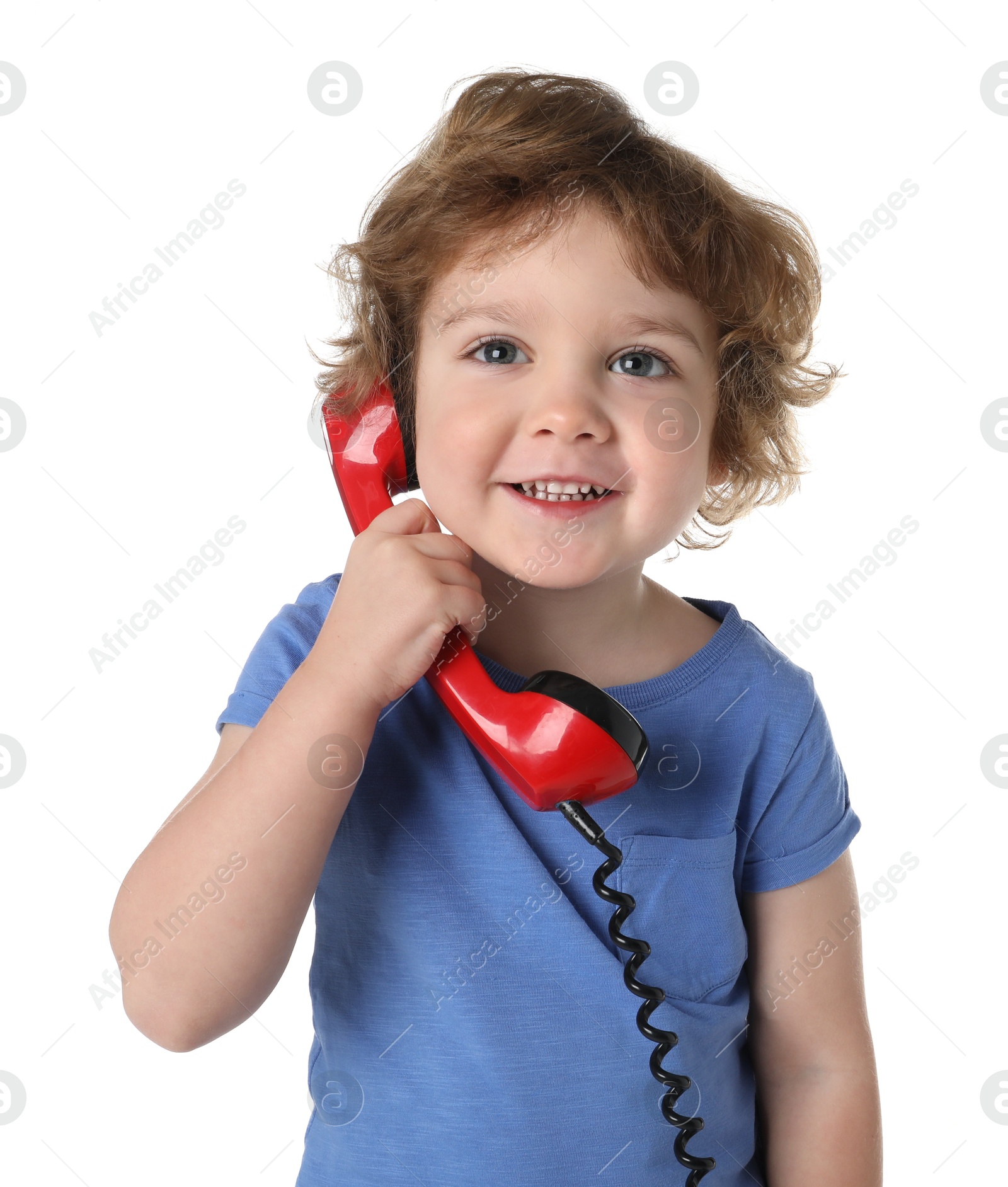 Photo of Cute little boy with telephone handset on white background