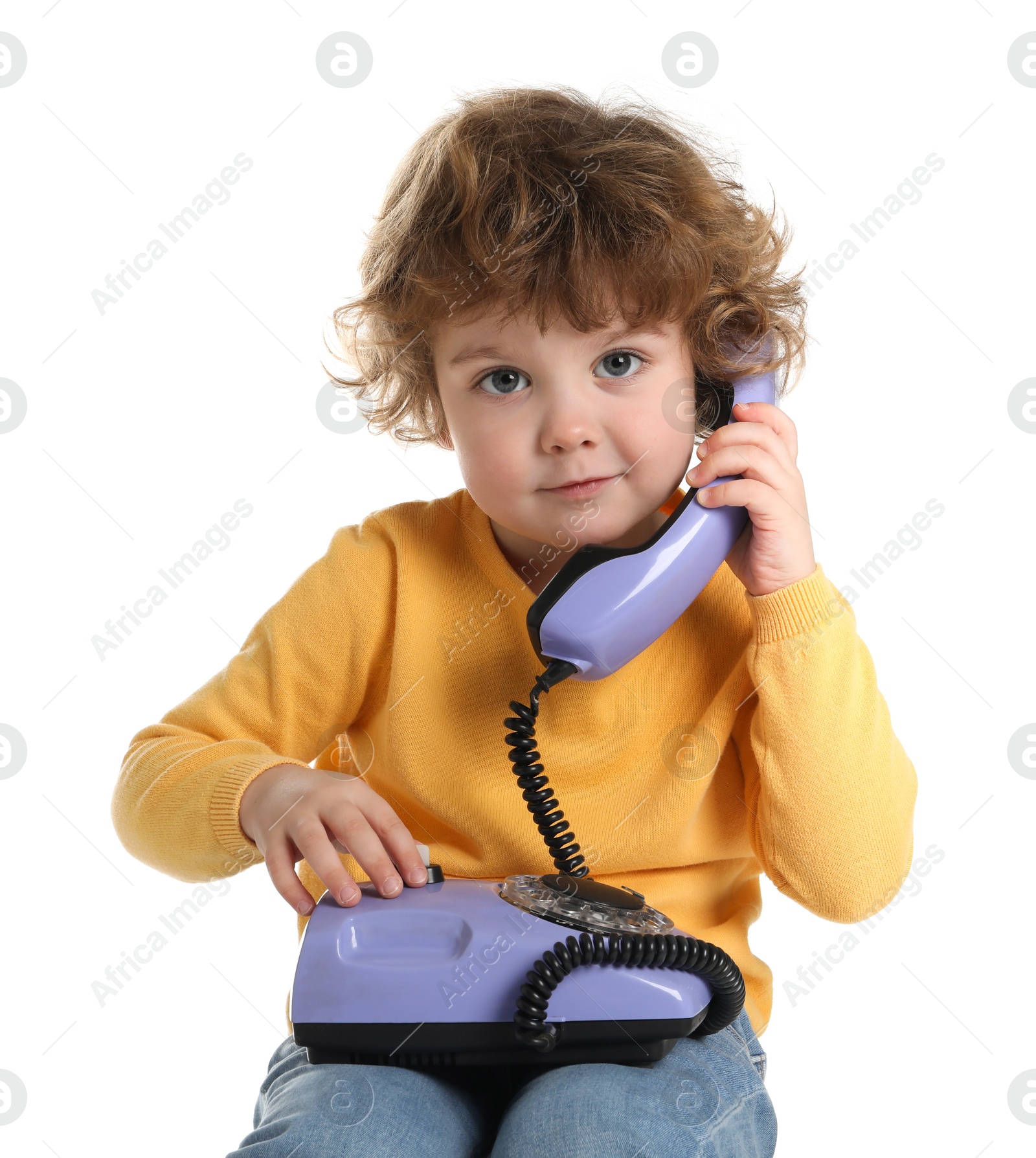 Photo of Cute little boy with telephone on white background