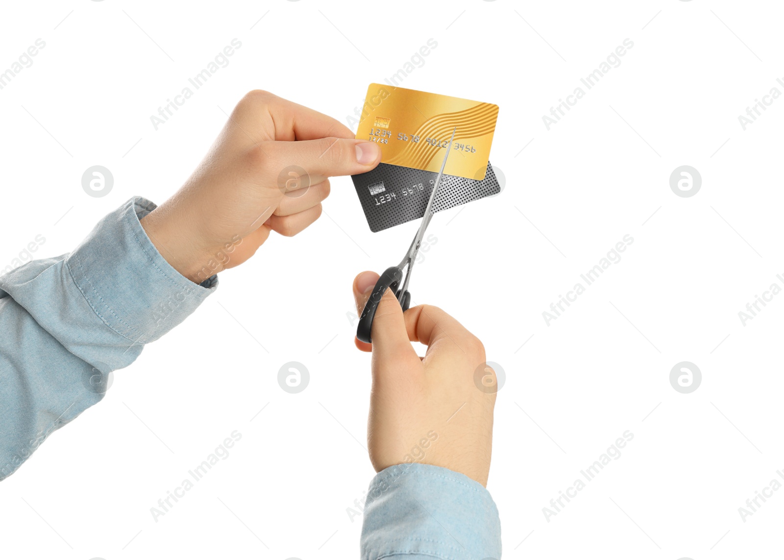 Photo of Woman cutting credit cards on white background, closeup