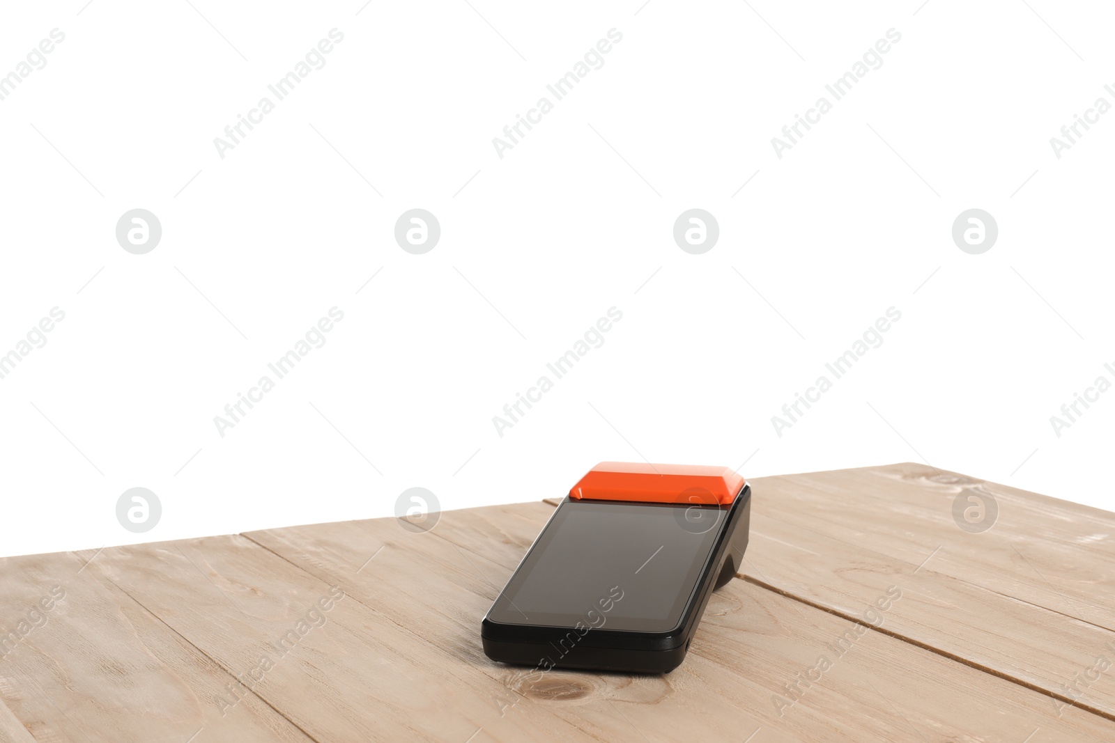 Photo of Payment terminal on wooden table against white background