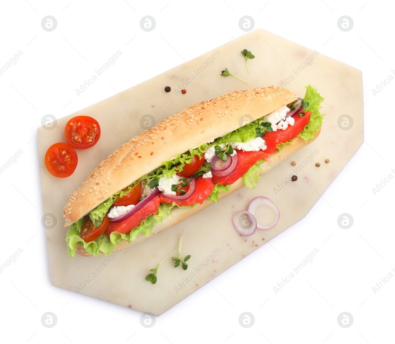 Photo of Delicious baguette sandwich with salmon isolated on white, top view