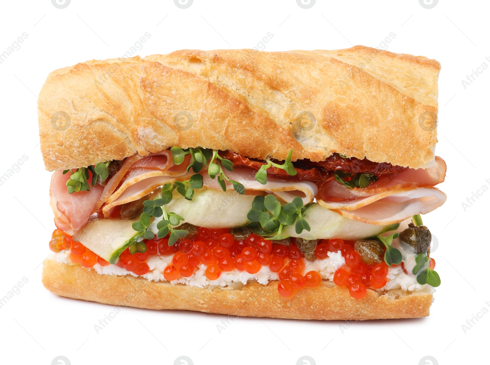 Photo of Delicious baguette sandwich with caviar, ham and capers isolated on white