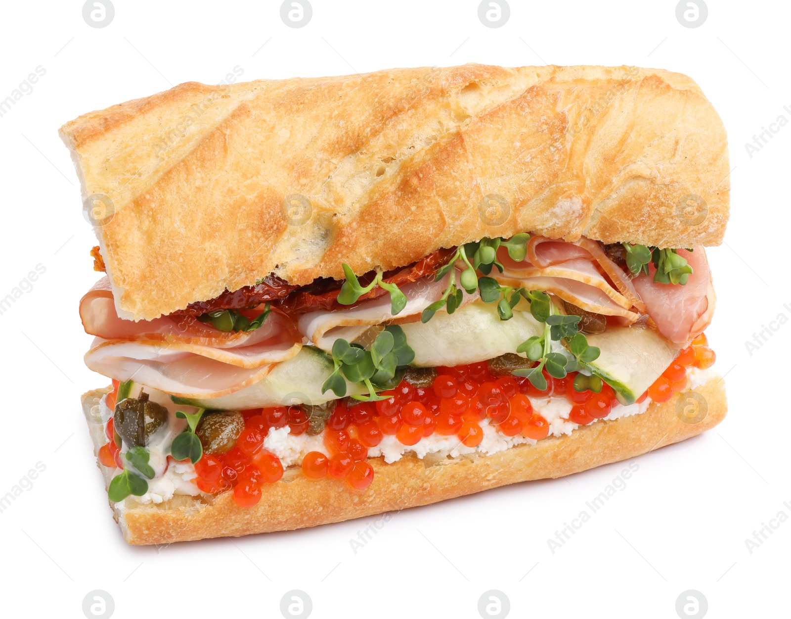 Photo of Delicious baguette sandwich with caviar, ham and capers isolated on white