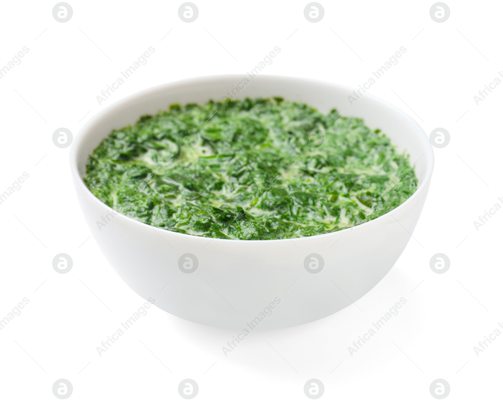 Photo of Delicious spinach sauce in bowl isolated on white