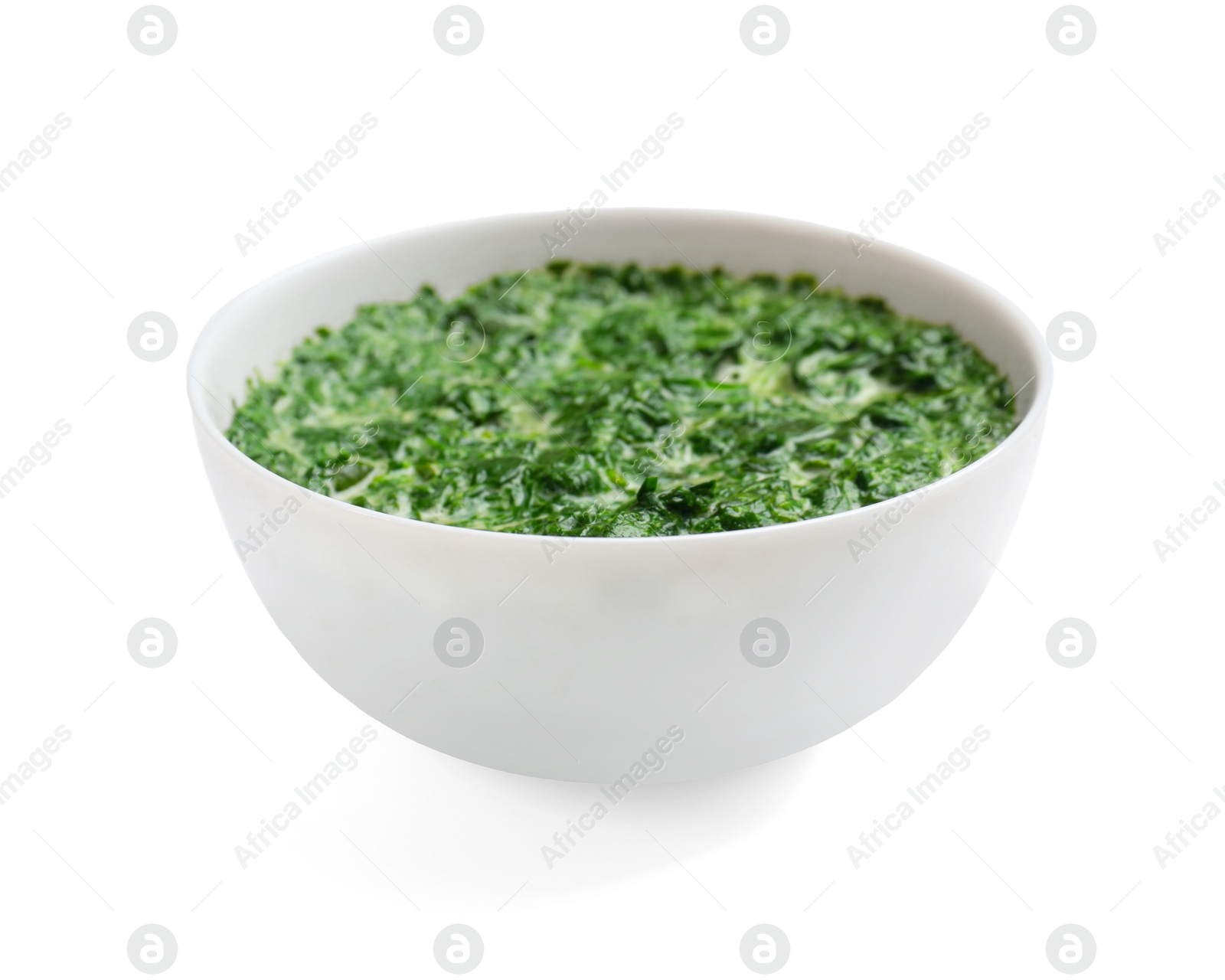 Photo of Delicious spinach sauce in bowl isolated on white