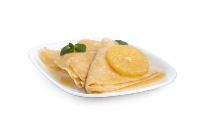 Photo of Delicious Crepes Suzette dessert isolated on white