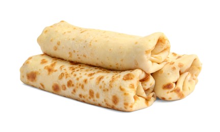 Photo of Three delicious rolled crepes isolated on white