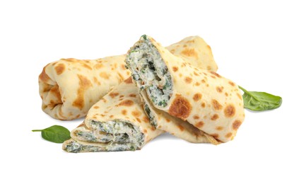 Photo of Tasty rolled crepes with cottage cheese and spinach isolated on white