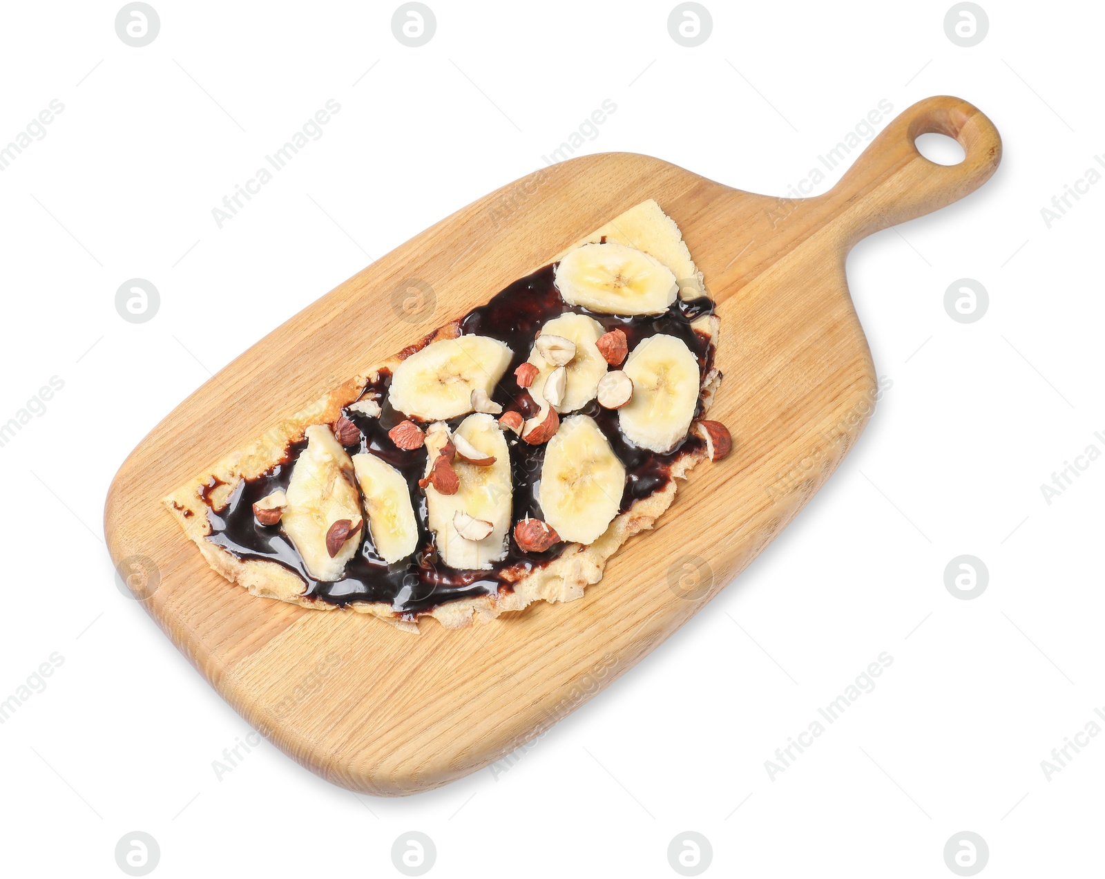 Photo of Delicious crepe with banana, nuts and chocolate sauce isolated on white