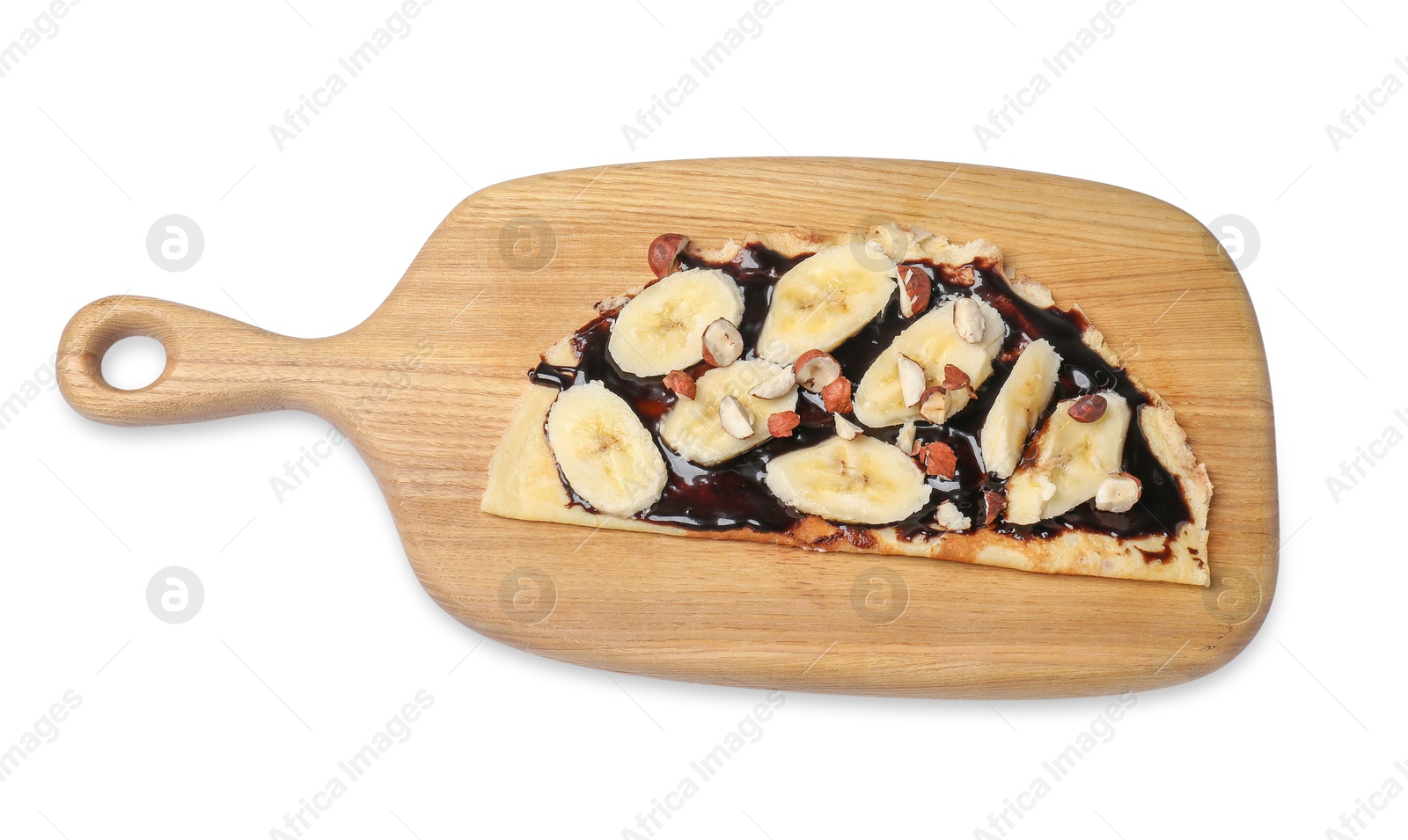 Photo of Delicious crepe with banana, nuts and chocolate sauce isolated on white, above view