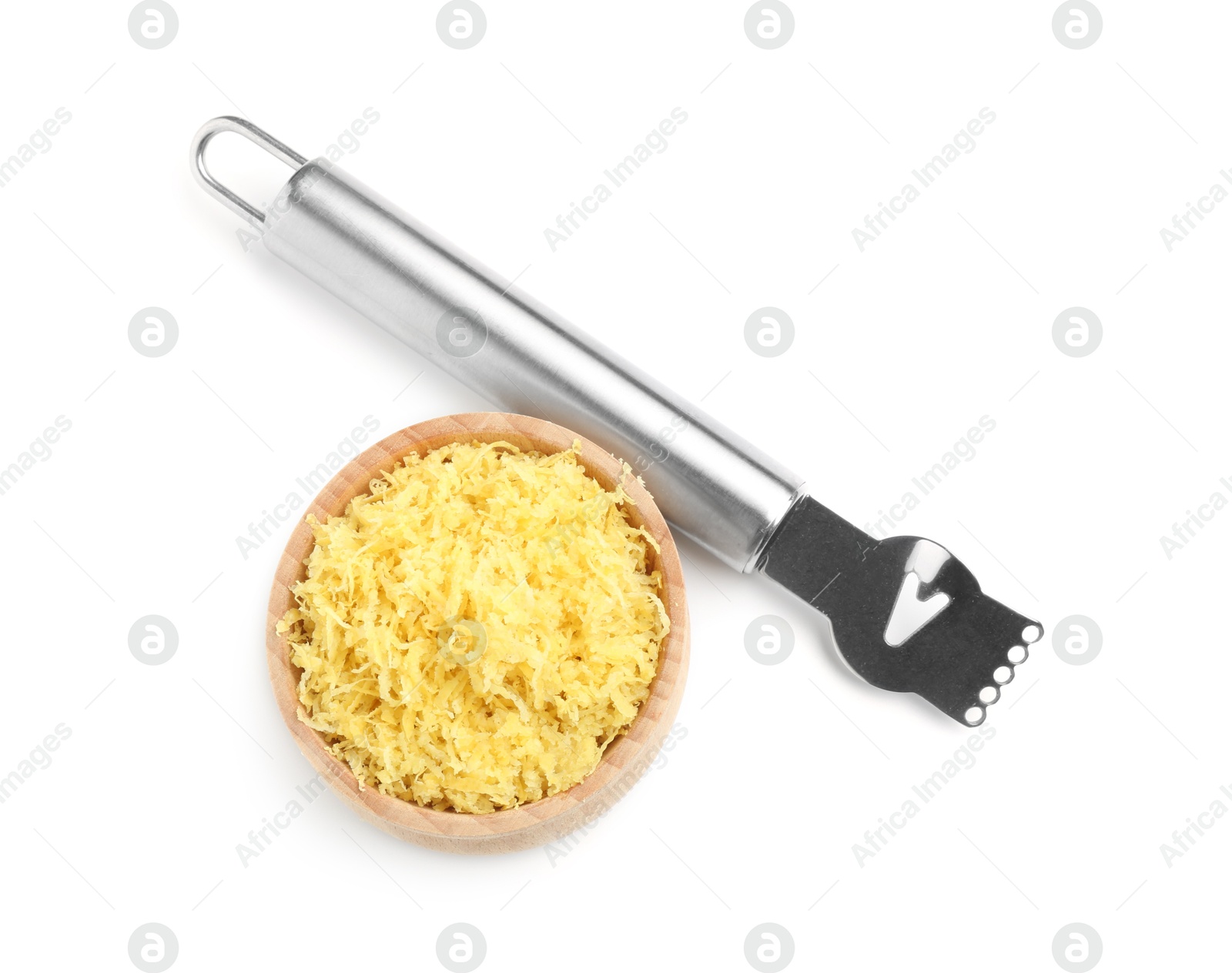 Photo of Fresh lemon zest and zester tool isolated on white, top view