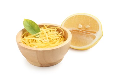 Photo of Lemon zest in bowl and piece of fresh fruit isolated on white