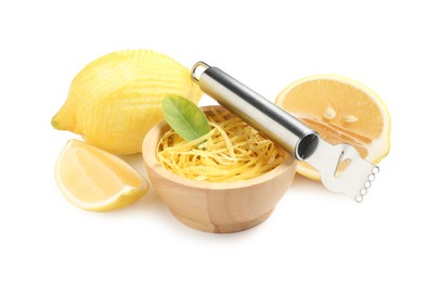 Photo of Lemon zest, zester tool and fresh fruits isolated on white