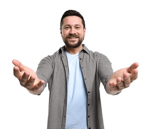 Photo of Happy man welcoming friends or guests on white background