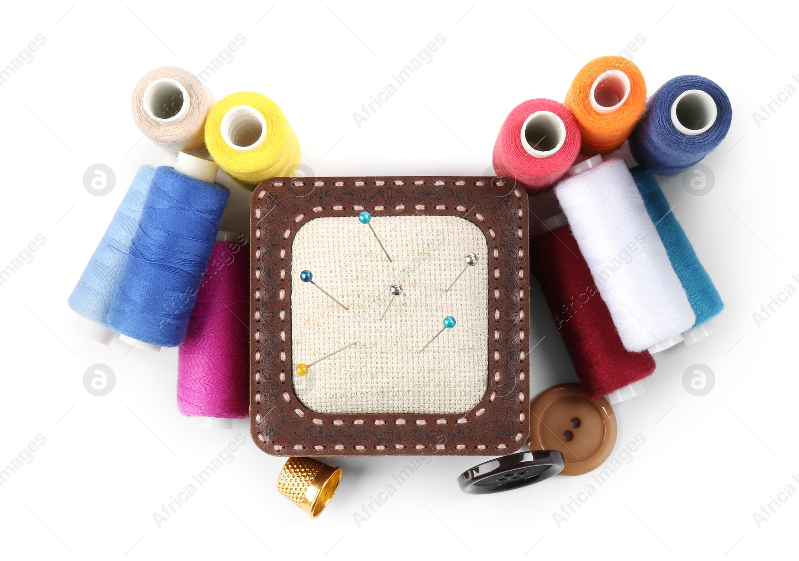 Photo of Different sewing supplies isolated on white, top view