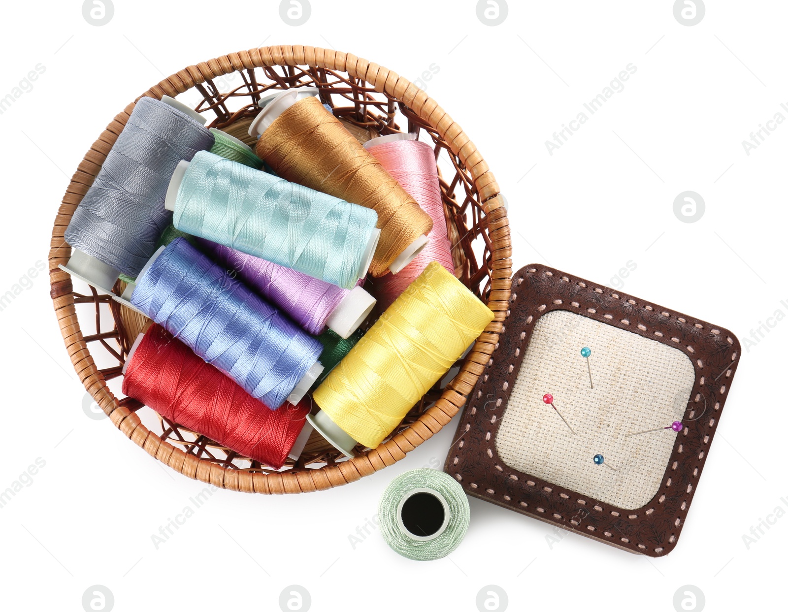 Photo of Different sewing supplies isolated on white, top view