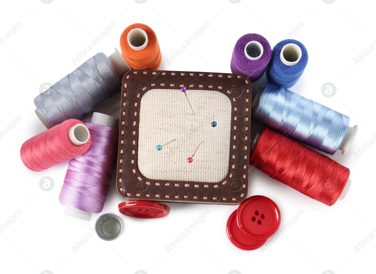 Photo of Different sewing supplies isolated on white, top view