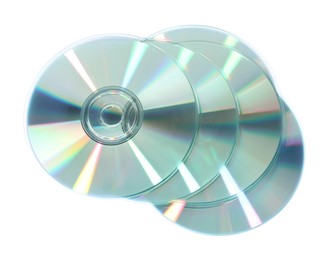 Photo of Many shiny compact discs isolated on white, top view