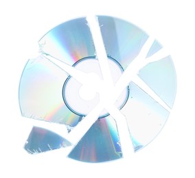 Photo of Broken compact disc isolated on white, top view