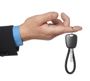 Photo of Man with car key and keychain on white background, closeup