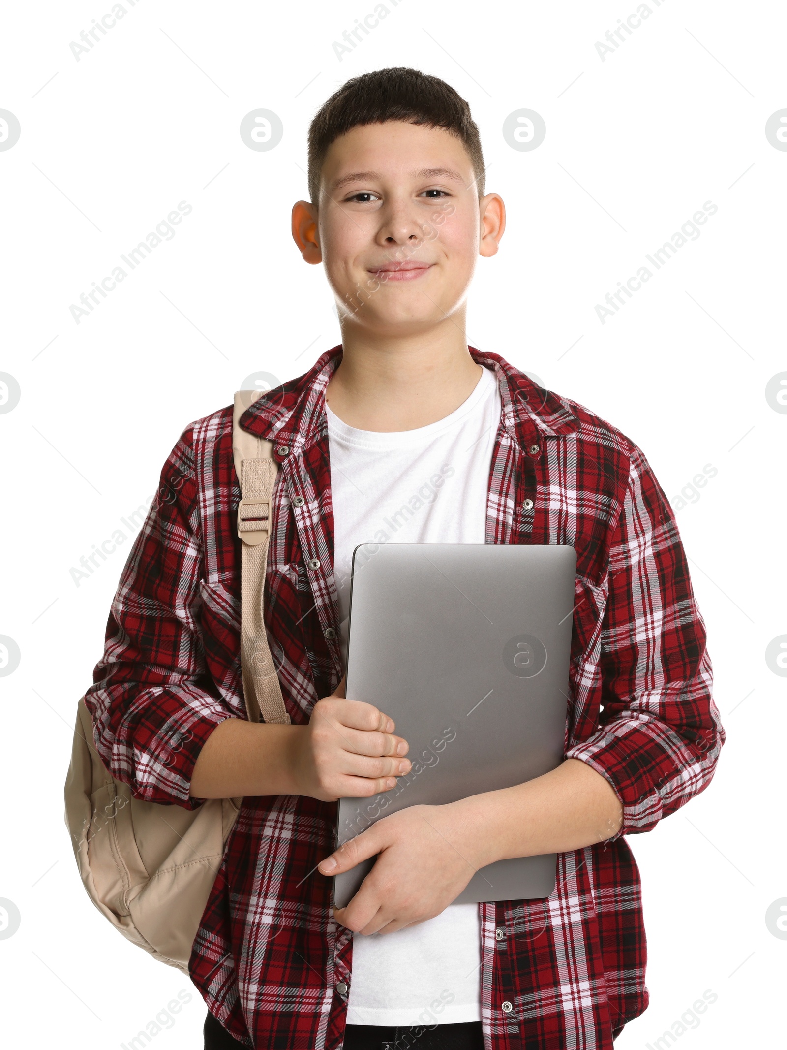 Photo of Portrait of teenage boy with laptop on white background