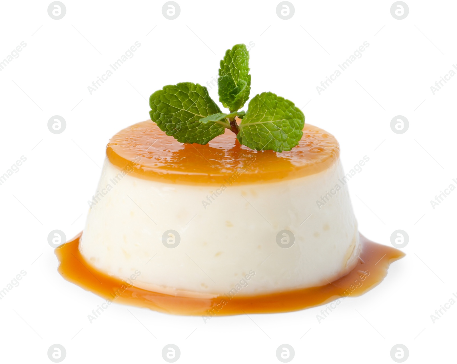 Photo of Tasty pudding with caramel sauce and mint isolated on white