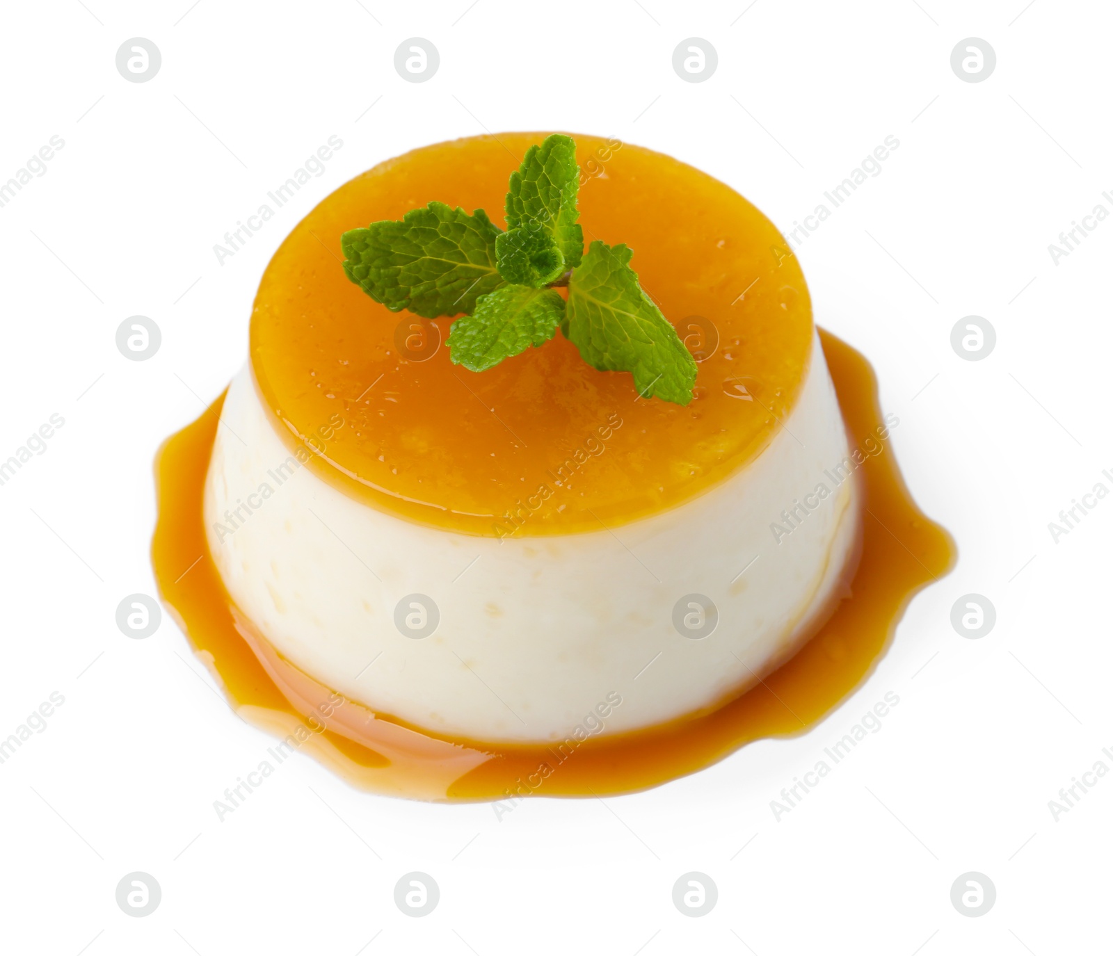 Photo of Tasty pudding with caramel sauce and mint isolated on white