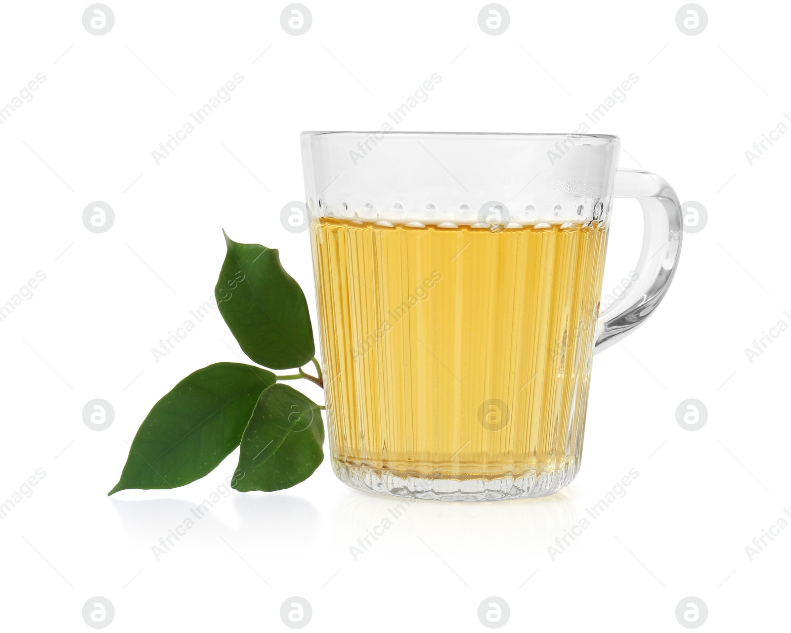 Photo of Refreshing green tea in cup and leaves isolated on white