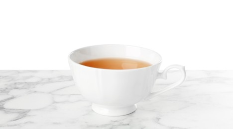 Photo of Refreshing green tea in cup on marble table against white background